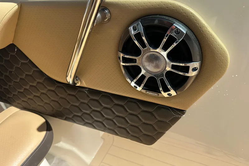 Slide: The Image of Speaker detail on 2022 Sea Ray SLX 250 boat with stylish upholstery. - 40