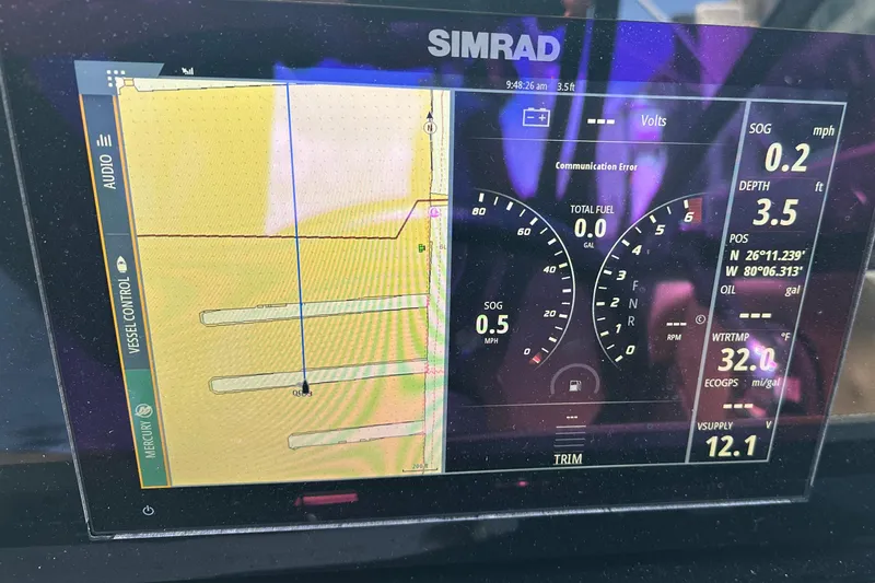 Slide: The Image of Simrad display on 2022 Sea Ray SLX 250 showing navigation and vessel data. - 17