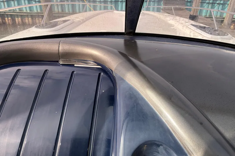Slide: The Image of Close-up of 2000 Sunseeker Superhawk 34 yacht deck, showcasing sleek design and detailing. - 16
