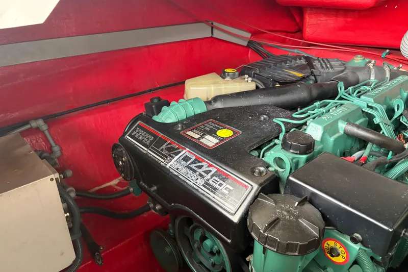Slide: The Image of Volvo Penta engine in a 2000 Sunseeker Superhawk 34, showcasing detailed mechanical components. - 32
