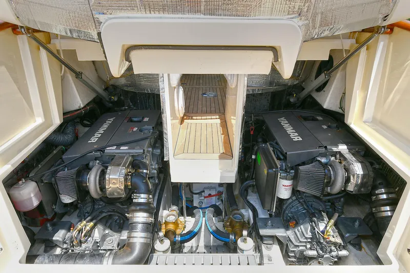 Slide: The Image of Engine compartment of a 2015 Hinckley Talaria 34, featuring dual Yanmar engines. - 31