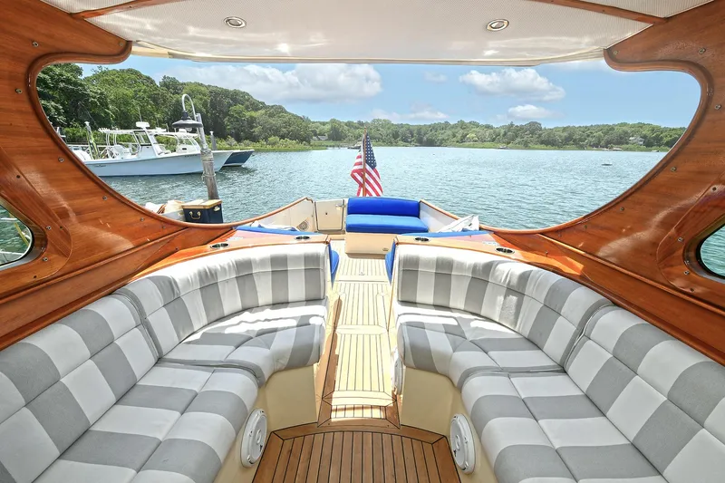 Slide: The Image of Luxurious interior of 2015 Hinckley Talaria 34 yacht with scenic water view. - 14