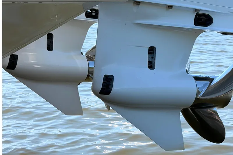 Slide: The Image of Twin outboard motors on a 2024 Sea Hunt Gamefish 27 Coffin Box boat. - 13