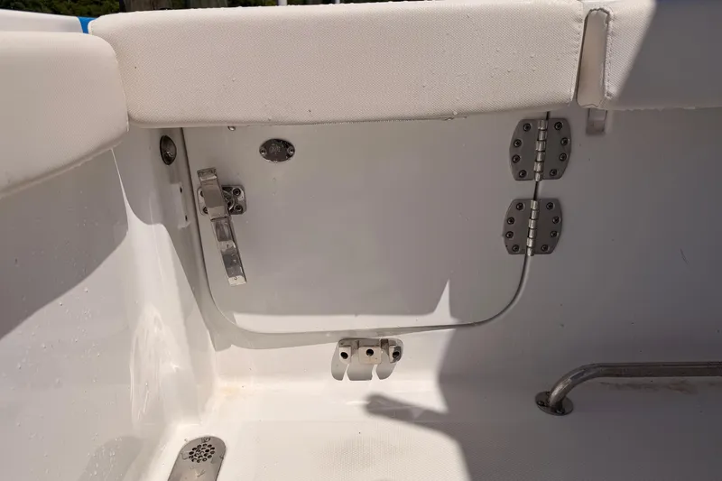 Slide: The Image of Interior view of 2024 Sea Hunt Gamefish 27 Coffin Box boat, featuring seating and hardware. - 17