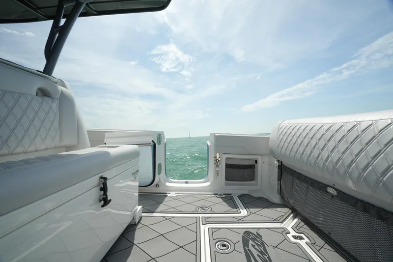 Slide: The Image of 2020 Nor-Tech 390 Sport Center Console boat interior with ocean view. - 36