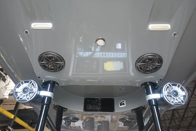 Slide: The Image of Underside view of a 2020 Blackwood 27 boat with speakers and lights. - 27