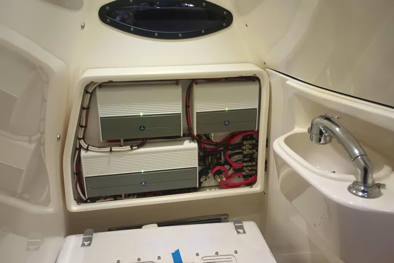 Slide: The Image of Electrical system inside a 2020 Blackwood 27 boat, featuring wiring and components. - 31