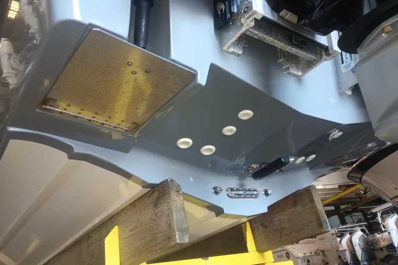 Slide: The Image of 2020 Blackwood 27 boat hull underside with mounting hardware and components. - 33