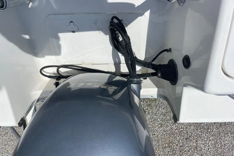 Slide: The Image of 2004 Sea Pro 238 Walk Around boat engine and wiring detail. - 32