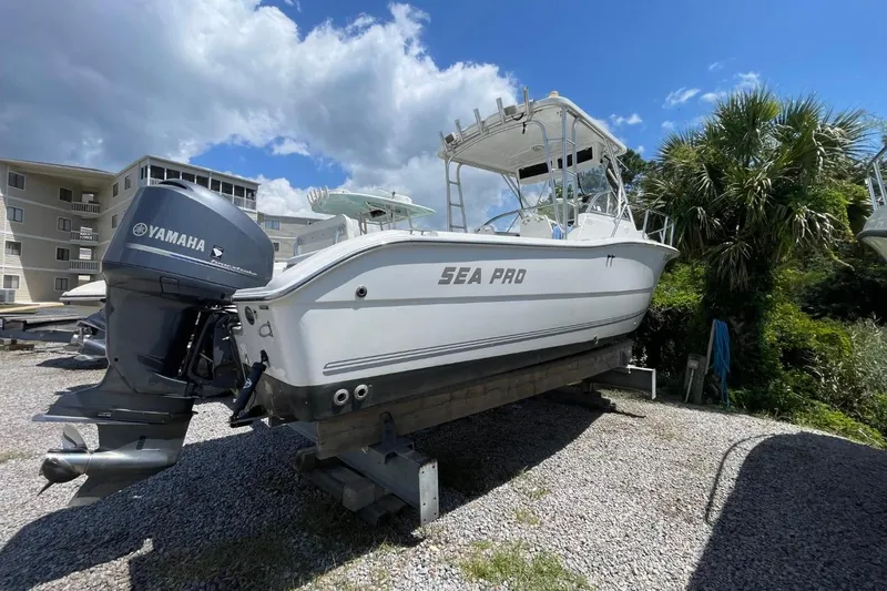 Slide: The Image of 2004 Sea Pro 238 Walk Around boat with Yamaha engine on dry dock. - 5