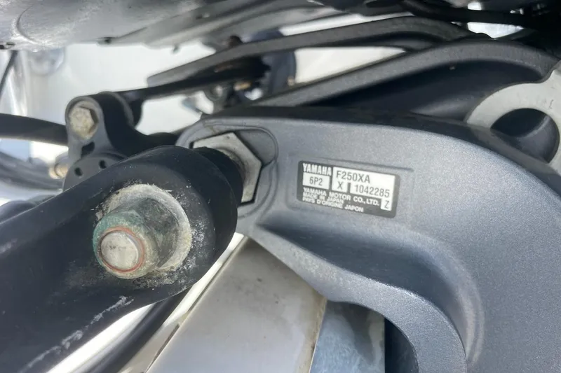 Slide: The Image of Close-up of Yamaha F250XA engine part on 2004 Sea Pro 238 Walk Around boat. - 9
