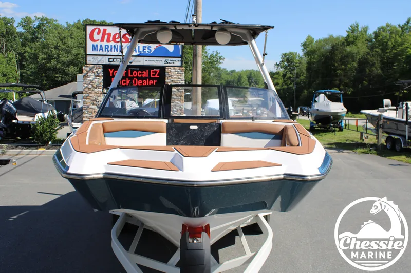 Slide: The Image of 2025 Axis A245 boat with modern design, displayed in a parking lot at Chessie Marine. - 8