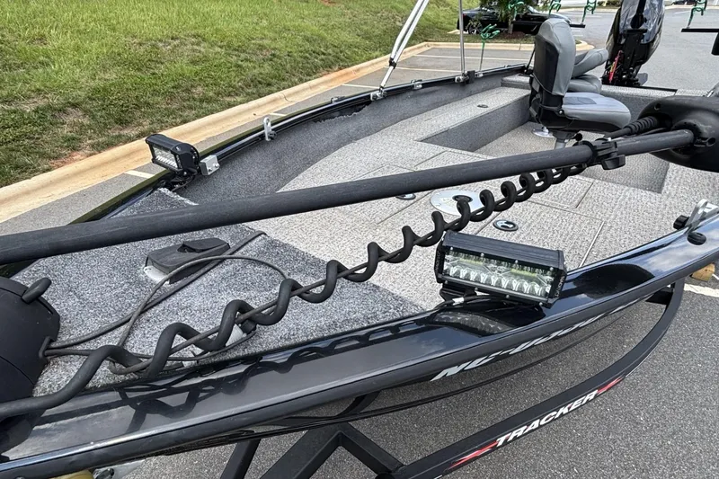 Slide: The Image of 2022 Tracker Super Guide V-16 T boat with trolling motor and LED lights. - 10
