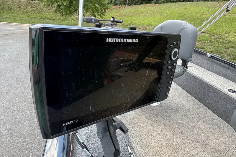 Slide: The Image of Humminbird Helix 10 fish finder on 2022 Tracker Super Guide V-16 T boat. - 5