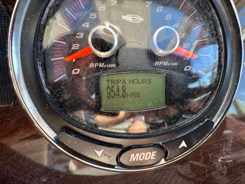 Slide: The Image of Close-up of a tachometer displaying 54.8 hours. - 14