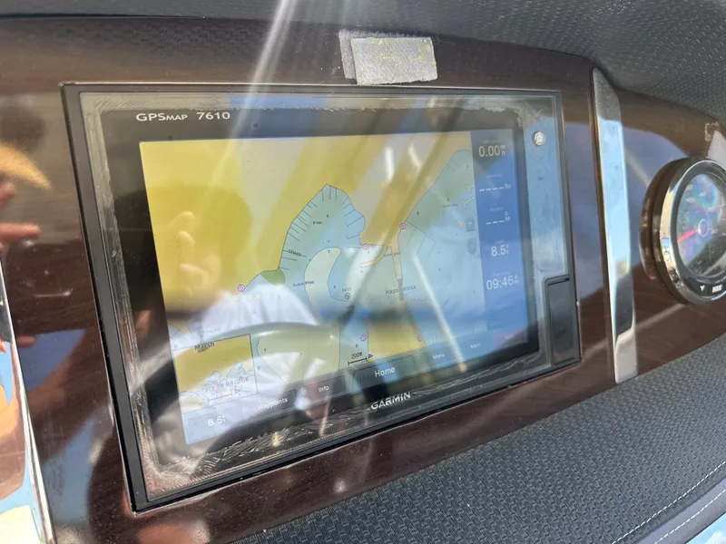 Slide: The Image of A GPS navigation system on a boat displays a map with course information. - 9