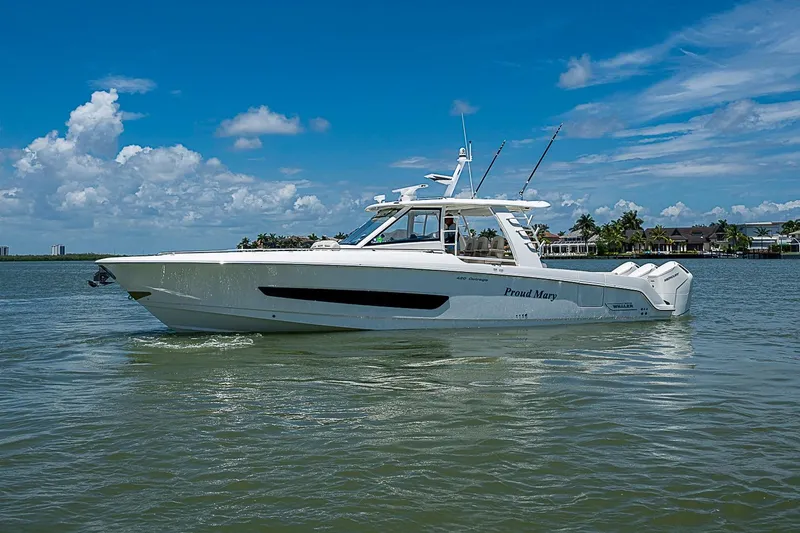 Slide: The Image of 2022 Boston Whaler 420 Outrage boat cruising on a sunny day with clear skies. - 41
