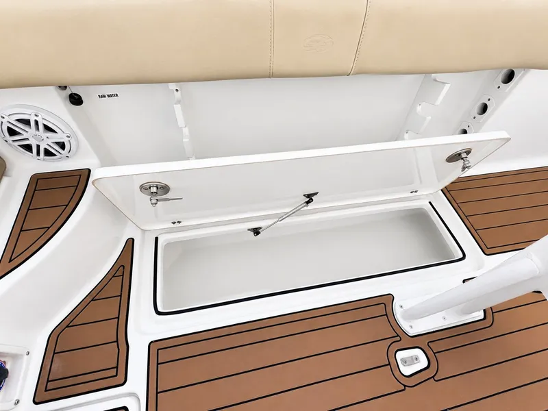 Slide: The Image of The image shows the deck area of a 2018 Sea Fox 266 Commander with storage and a speaker. - 24