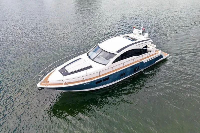 Slide: The Image of 2012 Fairline Targa 58 yacht cruising on calm waters. - 2