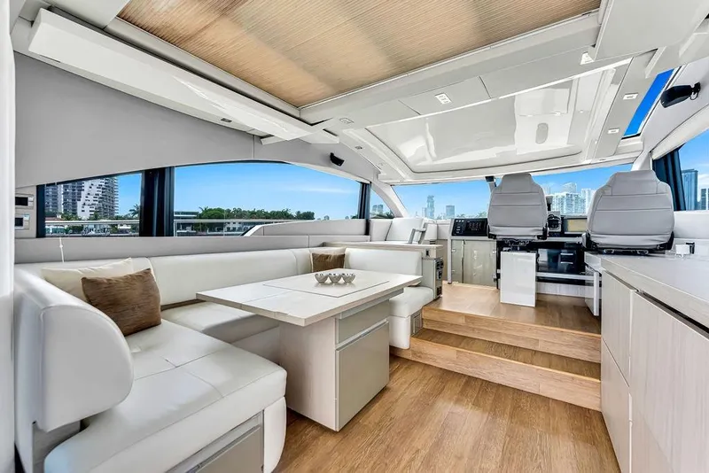Slide: The Image of Luxurious interior of 2012 Fairline Targa 58 yacht with modern seating and panoramic windows. - 20