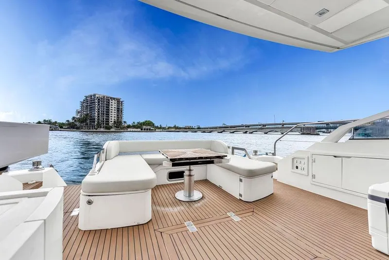 Slide: The Image of Luxurious 2012 Fairline Targa 58 yacht deck with scenic waterfront view. - 31