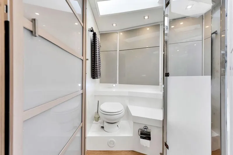 Slide: The Image of Luxurious bathroom in 2012 Fairline Targa 58 yacht with modern fixtures and sleek design. - 59
