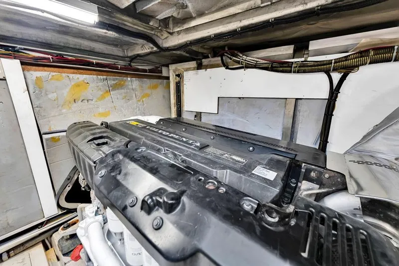 Slide: The Image of Engine room of 2012 Fairline Targa 58 yacht, featuring Volvo Penta engine. - 63