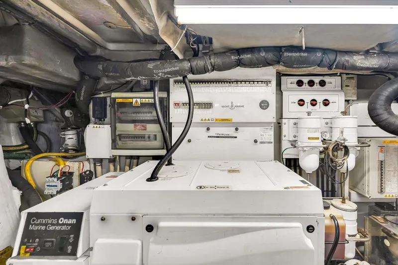 Slide: The Image of Engine room of 2012 Fairline Targa 58 yacht with Cummins Onan marine generator. - 64