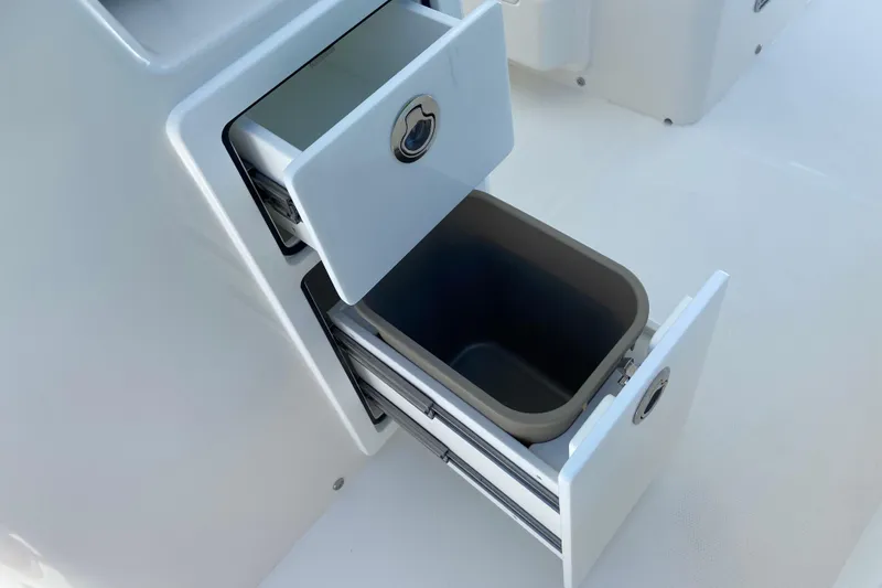 Slide: The Image of Storage compartments on a 2027 Regulator 30XO boat, featuring sleek design and functionality. - 25