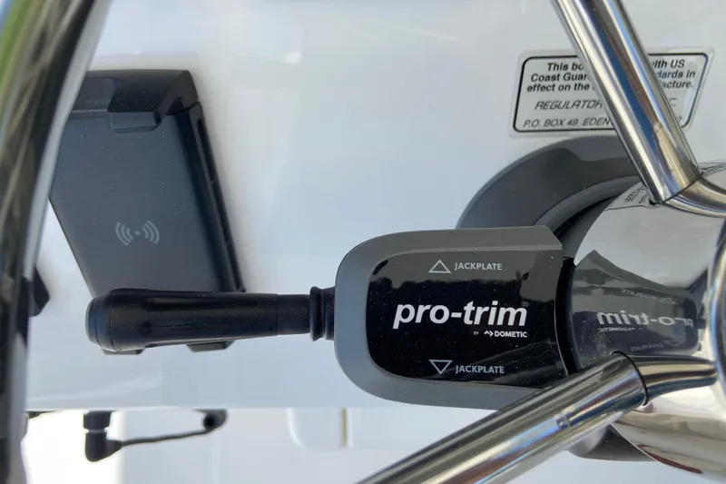 Slide: The Image of Close-up of 2027 Regulator 30XO boat's Pro-Trim control by Dometic. - 28