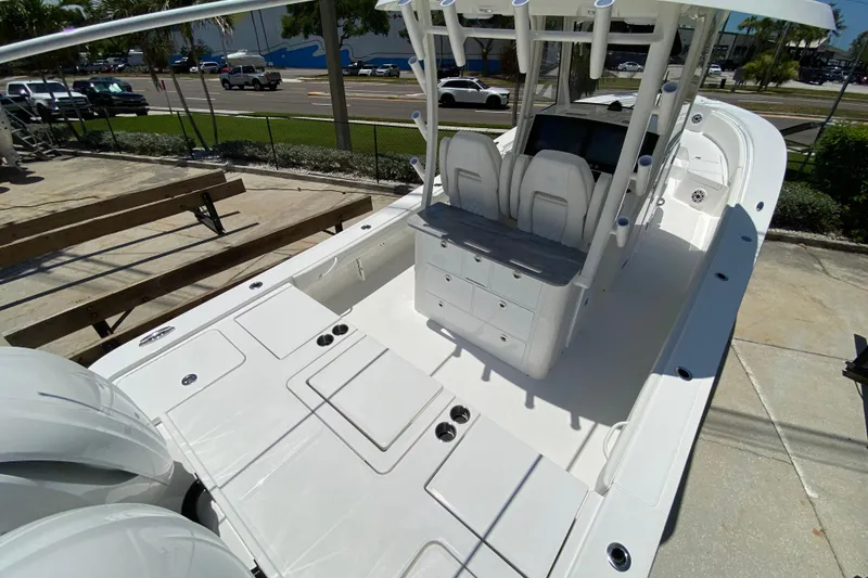 Slide: The Image of 2027 Regulator 30XO boat with dual engines and spacious deck layout. - 3