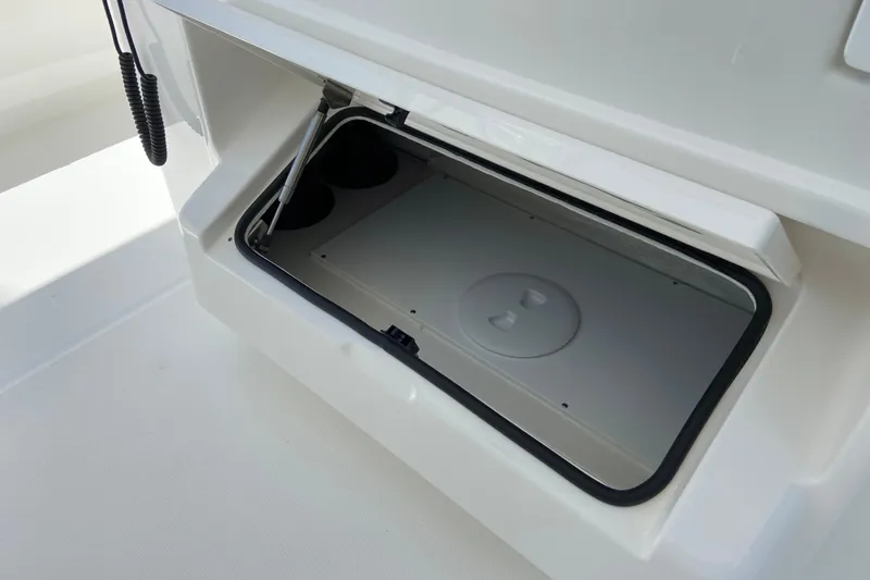 Slide: The Image of Storage compartment on a 2027 Regulator 30XO boat, showcasing sleek design and functionality. - 36