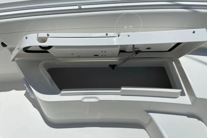 Slide: The Image of Open storage compartment on a 2027 Regulator 30XO boat, showcasing sleek design and functionality. - 39