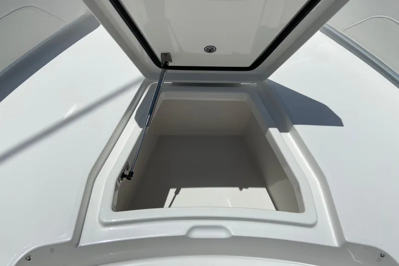 Slide: The Image of Open storage compartment on 2027 Regulator 30XO boat deck. - 40