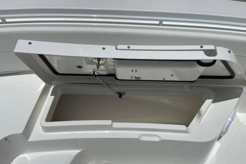 Slide: The Image of Open storage compartment on a 2027 Regulator 30XO boat, showcasing interior space. - 42