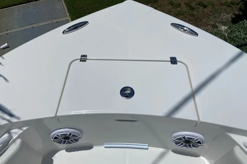 Slide: The Image of Bow view of 2027 Regulator 30XO boat, featuring sleek design and integrated speakers. - 43