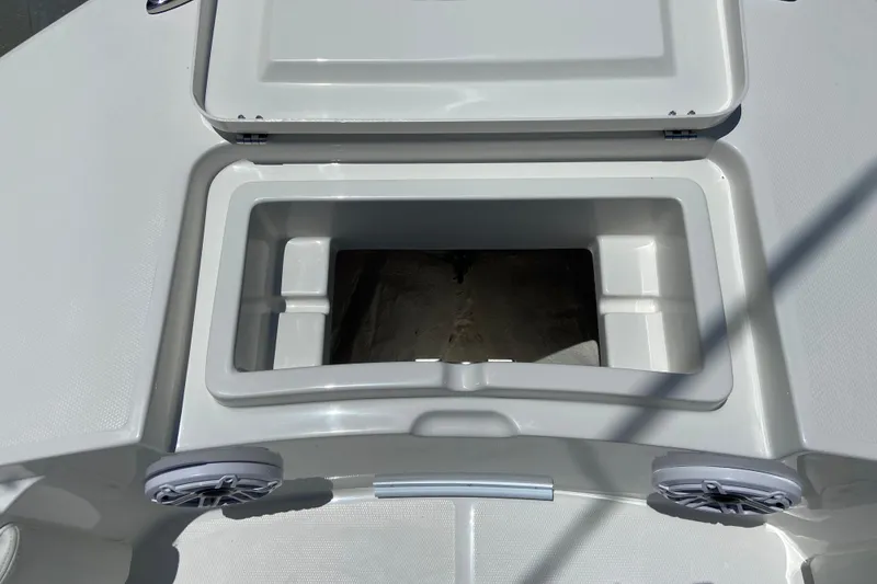 Slide: The Image of Open storage compartment on 2027 Regulator 30XO boat deck. - 44