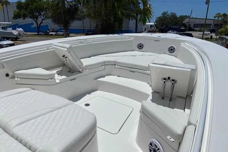 Slide: The Image of 2027 Regulator 30XO boat with luxurious white seating and modern design. - 46