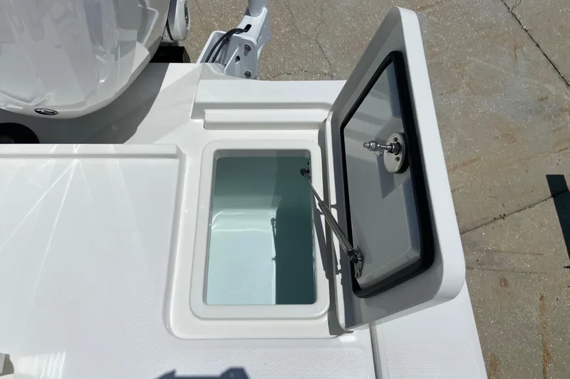 Slide: The Image of Open storage compartment on 2027 Regulator 30XO boat, showcasing sleek design and functionality. - 7