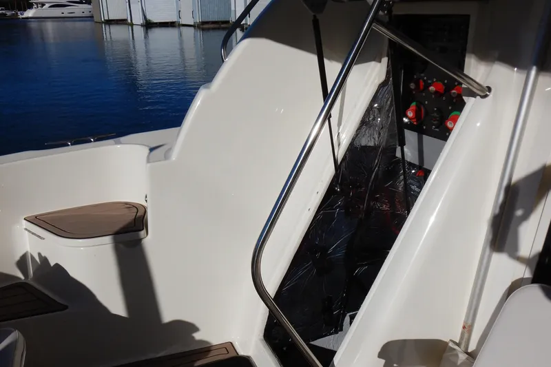 Slide: The Image of 2008 Meridian 411 Sedan yacht interior with control panel and seating area. - 42