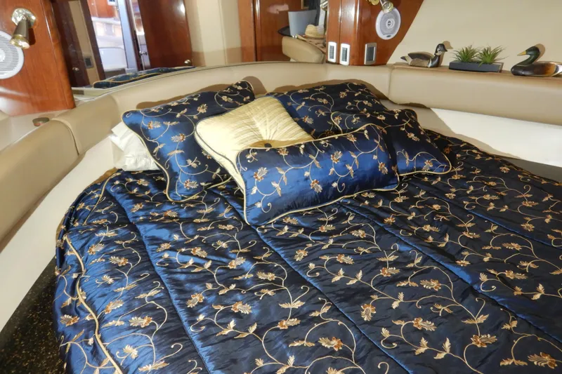 Slide: The Image of Luxurious bedroom interior of 2008 Meridian 411 Sedan yacht with elegant bedding. - 28