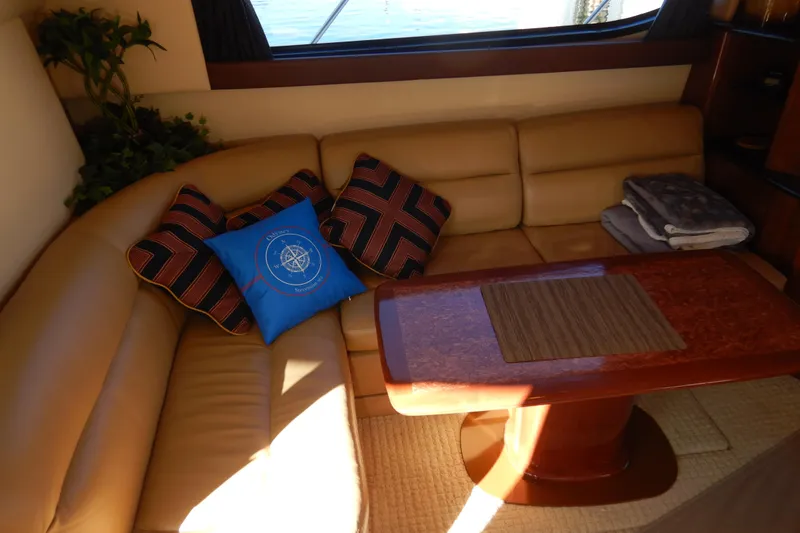 Slide: The Image of Luxurious interior of 2008 Meridian 411 Sedan with leather seating and decorative cushions. - 9