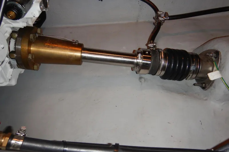 Slide: The Image of Close-up of a 2008 Meridian 411 Sedan boat's propeller shaft and coupling system. - 51