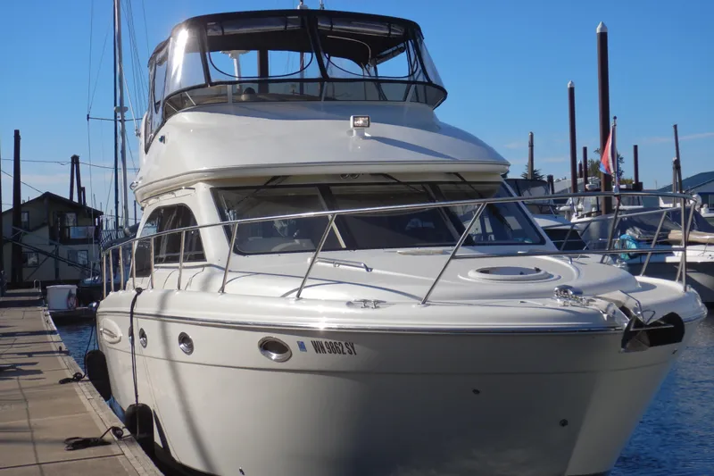 Slide: The Image of 2008 Meridian 411 Sedan yacht docked at marina under clear blue sky. - 3
