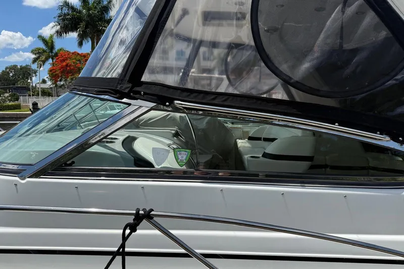 Slide: The Image of 2008 Formula 37 Performance Cruiser docked, featuring sleek design and spacious interior. - 10