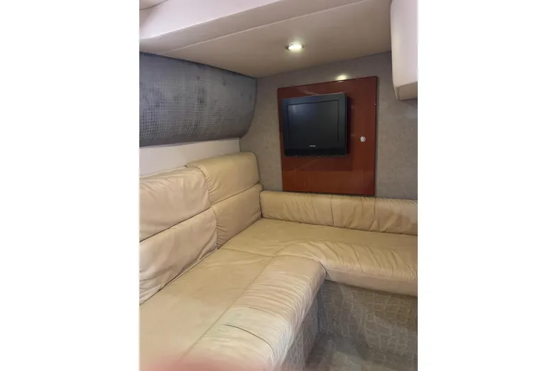 Slide: The Image of Interior of 2008 Formula 37 Performance Cruiser with beige leather seating and wall-mounted TV. - 26