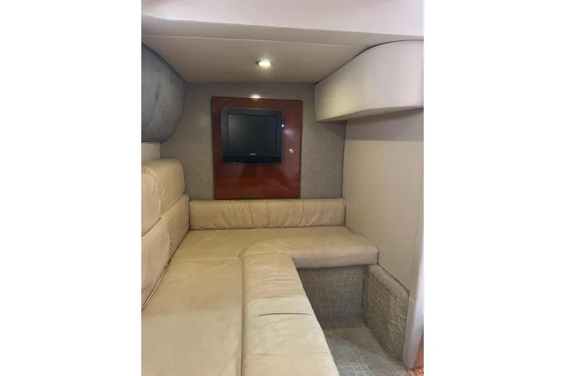 Slide: The Image of Interior of 2008 Formula 37 Performance Cruiser with beige seating and wall-mounted TV. - 29