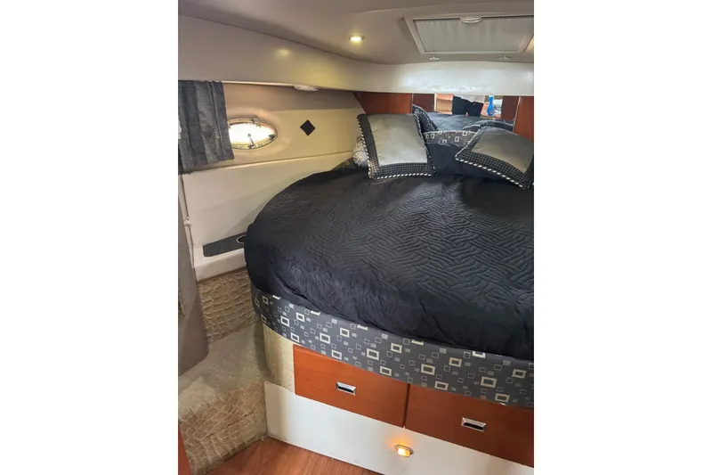 Slide: The Image of Luxurious cabin interior of a 2008 Formula 37 Performance Cruiser with cozy bedding. - 35