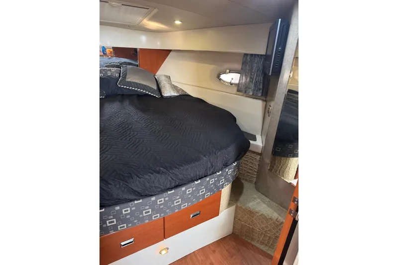 Slide: The Image of Interior cabin of 2008 Formula 37 Performance Cruiser with cozy bed and modern decor. - 37