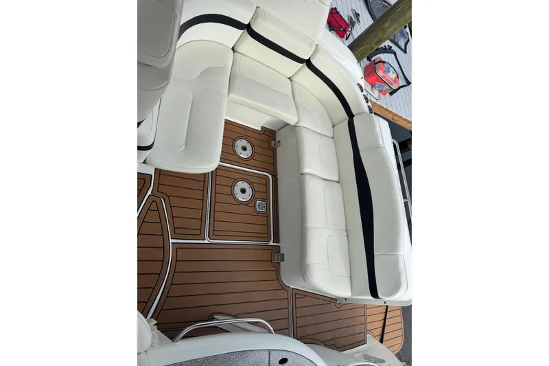 Slide: The Image of 2008 Formula 37 Performance Cruiser interior with white seating and teak-style flooring. - 41